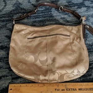 Goldish brown Coach hobo bag